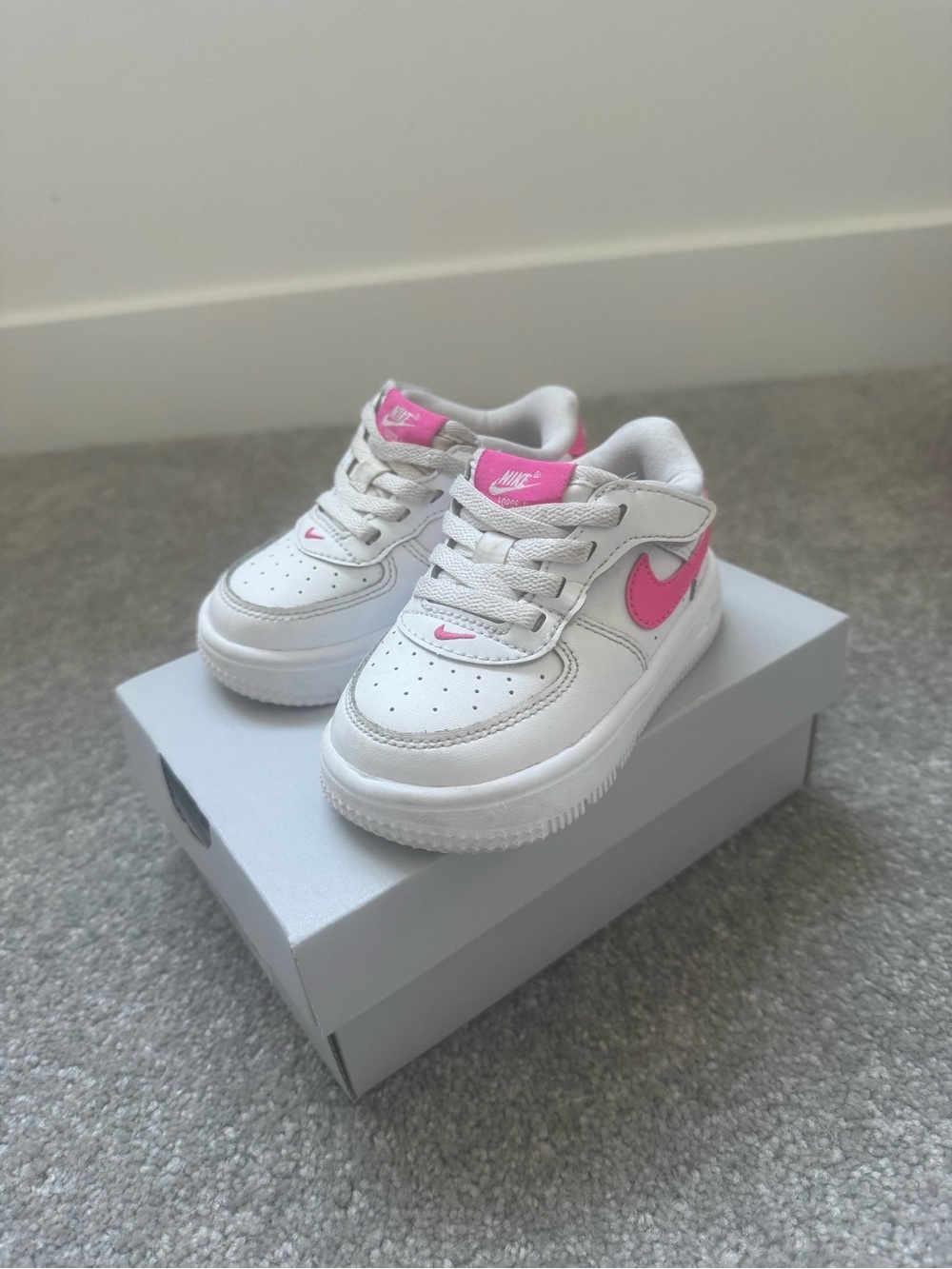 Nike White Sneakers with Pink Swoosh for Kids